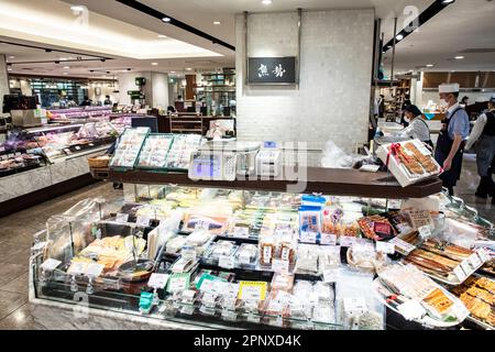 Food hall Japan April 2023, prepared foods meat and shellfish and groceries for sale in a department store food hall Tokyo,Japan Stock Photo