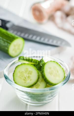 Sliced fresh green cucumber in the bowl. Stock Photo