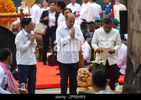 Angkor Wat, Siem Reap, Cambodia - April 13, 2023: Hun Many ,centre, member of the Cambodian National Assembly, praying at Angkor Wat. Stock Photo