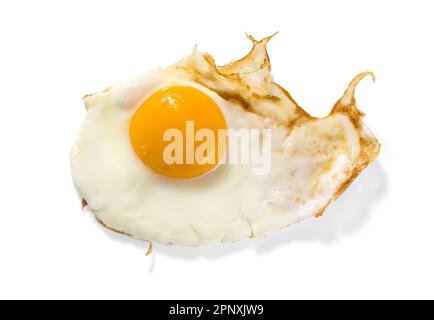 Appetizing portion of fried chicken egg with liquid yolk isolated on white background Stock Photo