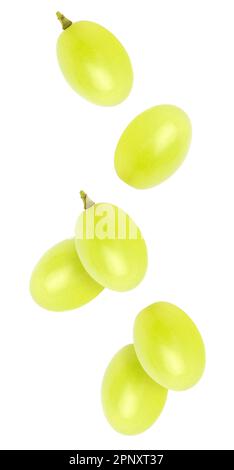 Isolated flying grapes. Falling grape fruits isolated on white background, with clipping path Stock Photo