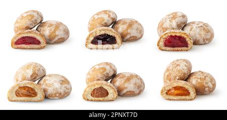 Isolated cake collection. Pile of icing cakes with different fruit filling isolated on white background with clipping path Stock Photo