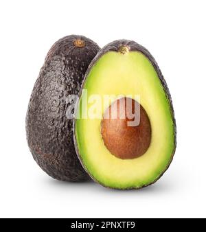 Isolated avocados. Whole and a half of black avocado fruits isolated on white background with clipping path Stock Photo