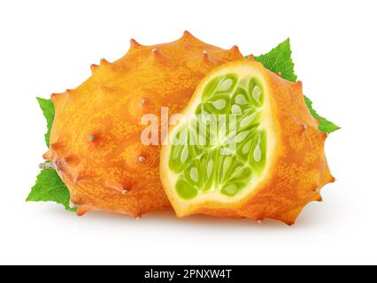 Isolated kiwanos. One fresh kiwano melon fruit and a half with leaves isolated on white background with clipping path Stock Photo