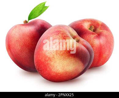 Isolated nectarines. Three whole nectarine fruits with leaves isolated on white background Stock Photo