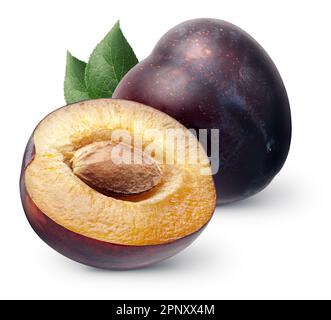 Isolated plums. One whole and a half of blue plum fruit with leaves isolated on white background, with clipping path Stock Photo