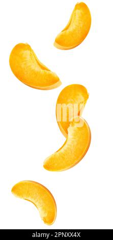 Falling apricot slices. Flying apricot fruit pieces isolated on white background with clipping path Stock Photo