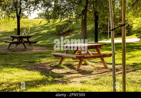 green landscape with picnic tables in the countryside Stock Photo