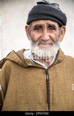 Portrait of an elderly berber dressed in the traditional djellaba. Stock Photo
