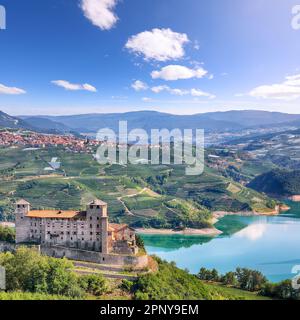 Fabulous  View of the Cles Castel, the Santa Giustina Lake and lots of apple plantations. Location: Cles, Trentino-Alto Adige region, Italy, Europe Stock Photo
