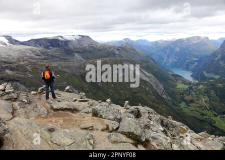 Tourists at the Dalsnibba mountain viewpoint, Geirangerfjord, UNESCO World Heritage Site, Sunnmøre region, Møre og Romsdal county, Western Norway, Sca Stock Photo