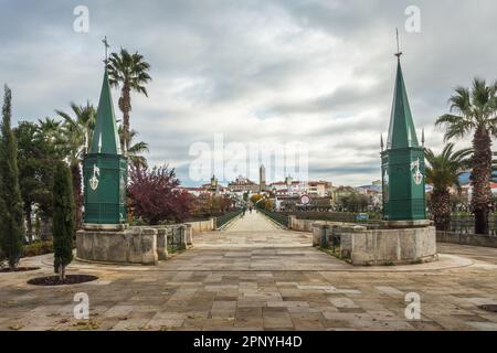 View of the entrance to the medieval bridge of Mirandela in Portugal, with two niches dedicated to Nossa Senhora do Amparo and Senhor dos Aflitos. Stock Photo