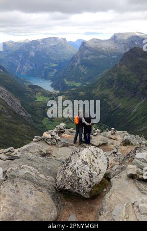 Tourists at the Dalsnibba mountain viewpoint, Geirangerfjord, UNESCO World Heritage Site, Sunnmøre region, Møre og Romsdal county, Western Norway, Sca Stock Photo