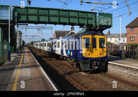 Northern Trains class 319 electric multiple-unit, 319367, passing through Layton railway station, Blackpool on 21st April 2023. Stock Photo