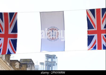 Getting ready for King Charles III Coronation, the Union Jack bunting is up on Oxford Street, London, UK Stock Photo