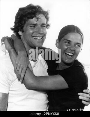 RYAN O'NEAL and ALI MacGRAW in LOVE STORY 1970 director ARTHUR HILLER writer Erich Segal music Francis Lai Love Story Company / Paramount Pictures Stock Photo