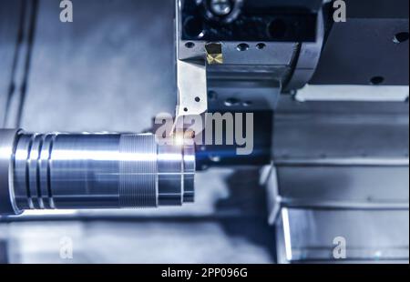 CNC lathe machine cutting the metal screw thread part, The hi-technology parts manufacturing Stock Photo
