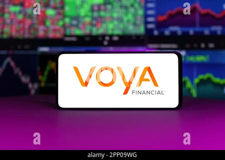 Voya financial on stock market in front of stock market charts background Stock Photo