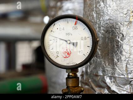 Manometer showing level of steam pressure inside of steam generation vessel. Stock Photo