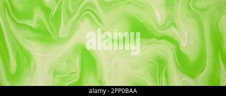 Abstract fluid art background bright green and olive colors. Liquid marble. Acrylic painting on canvas with gradient and splash. Alcohol ink backdrop Stock Photo