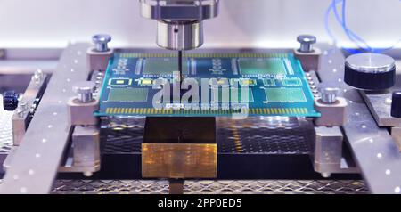 High technology and modern automatic robot for print circuit board (PCB) component at factory Stock Photo