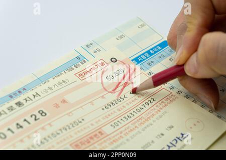 Tax related concept with various utility bills and receipts Stock Photo