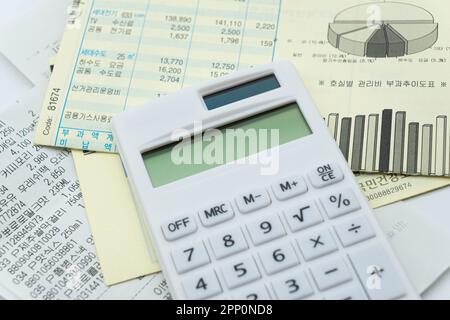 Tax related concept with various utility bills and receipts Stock Photo