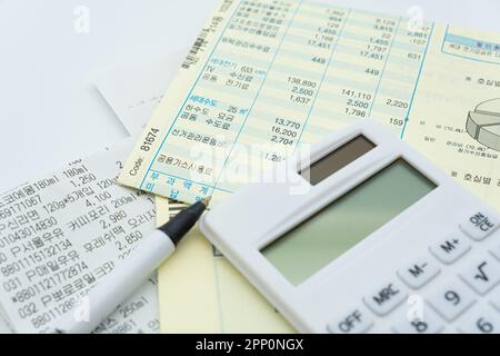 Tax related concept with various utility bills and receipts Stock Photo