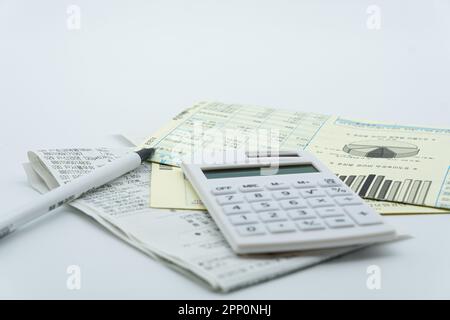 Tax related concept with various utility bills and receipts Stock Photo