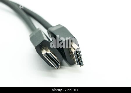 Close-up view of HDMI cables on a white background. Stock Photo