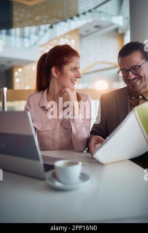 young smiling people having business meeting in office Stock Photo