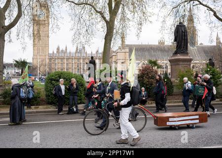 Climate Change activists protest outside parliament in Westminster on the first day of Extinction Rebellion's 'The Big One', on 21st April 2023, in London, England. Stock Photo