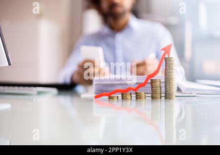African American Tax Payment And Inflation Calculator Stock Photo