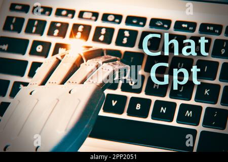 Florence , Italy April 19th 2023. ChatGPT neon light sign concept, open ai chat gpt bot and artificial intelligence technology. Robot hand typing on c Stock Photo