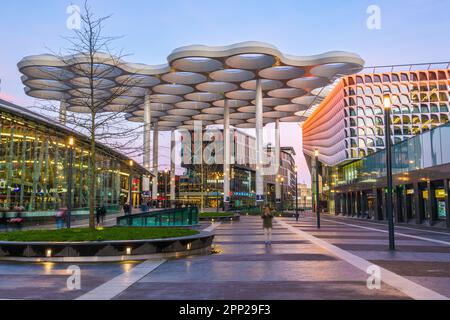 UTRECHT, NETHERLANDS - FEBRUARY 28, 2020: Utrecht Centraal Railway Station from Station Square with Hoog Catharijne shopping mall at twilight. Stock Photo