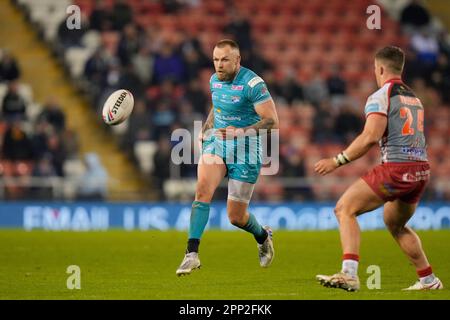 Blake Austin #6 of Leeds Rhinos kicks through during the Betfred Super League Round 10 match Leigh Leopards vs Leeds Rhinos at Leigh Sports Village, Leigh, United Kingdom, 21st April 2023  (Photo by Steve Flynn/News Images) Stock Photo