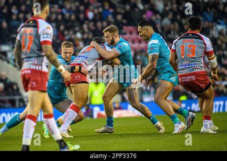 Leigh, Greater Manchester, UK. 21st Apr 2023. Leigh Leopards' Tom Amone is tackled during the BetFred Super League match between Leigh Leopards and Leeds Rhinos at Leigh Sport Stadium, Leigh on Friday 21st April 2023. (Photo: Ian Charles | MI News) Stock Photo