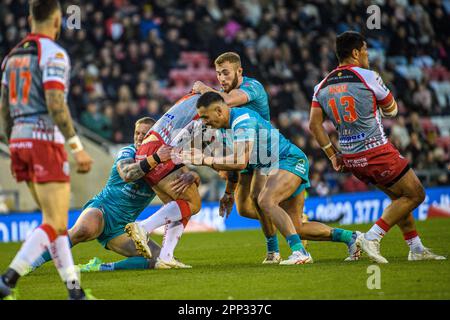 Leigh, Greater Manchester, UK. 21st Apr 2023. Leigh Leopards' Tom Amone is tackled during the BetFred Super League match between Leigh Leopards and Leeds Rhinos at Leigh Sport Stadium, Leigh on Friday 21st April 2023. (Photo: Ian Charles | MI News) Stock Photo