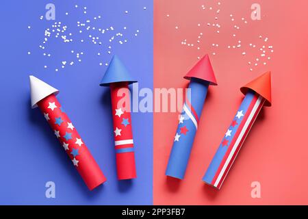 Firework rockets and confetti for Independence Day on colorful ...