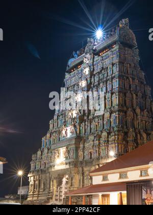 The Chidambaram Thillai Natarajar temple is located in the town of Chidambaram, Tamil Nadu, India. the full view of Gopuram during night time Stock Photo