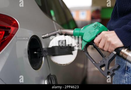 File photo dated 01/09/21 of an E10 petrol pump at a petrol station. A near-continuous fall in petrol prices since November 2022 has been halted due to a rise in the cost of oil, according to new analysis. The AA said the average price of a litre of petrol at UK forecourts was 146.9p on Wednesday, up by 0.5p since the end of March. This comes as the typical cost of a barrel of oil has risen by more than 10 US dollars since mid-March after oil producer group Opec cut production. Issue date: Saturday April 22, 2023. Stock Photo