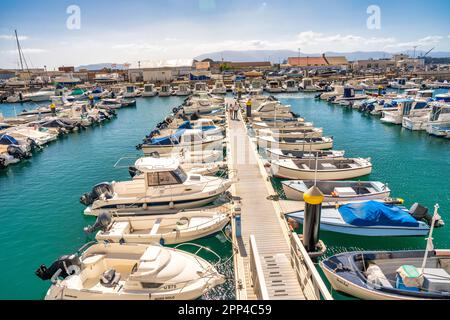 Gibraltar, UK - April 7, 2023: Many small boats anchored in the city port. Stock Photo