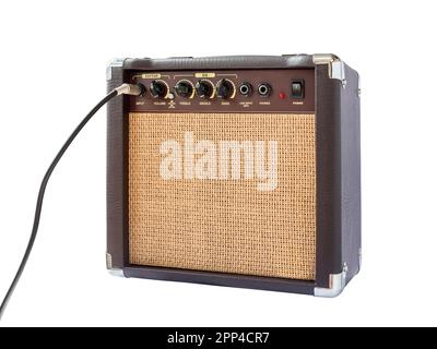 Small acoustic guitar amplifier with cable isolated on white background Stock Photo