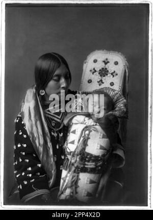 The white bits on the top are elk/moose teeth. Photographer: Edward S. Curtis Stock Photo