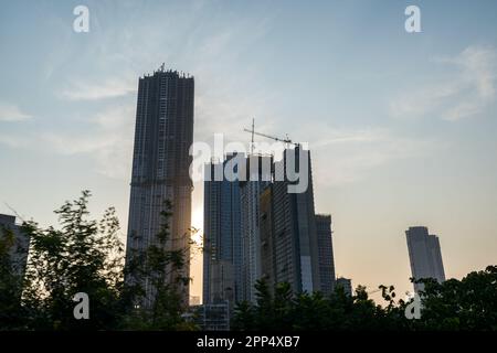 Modern city high rise skyscraper buildings during sunset time in Mumbai, India Stock Photo
