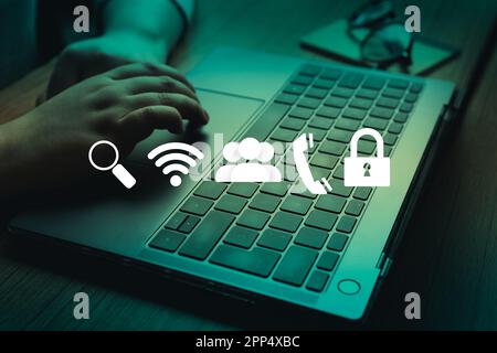 Woman using laptop with customer support interface and copy space. Internet of things. Customer support hotline people connect. Feedback. Stock Photo