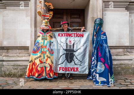 London UK. 22 April 2023. Activists from Extinction Rebellion in colourful costumes representing the oceans and life  on the second of four days of The Big One climate protest supported by a coalition of over 200 environemtal groups and organisations including Greenpeace, Avaaz, Friends of the Earth, PCS, CND, Global Justice Now and War On Want . Credit: amer ghazzal/Alamy Live News Stock Photo