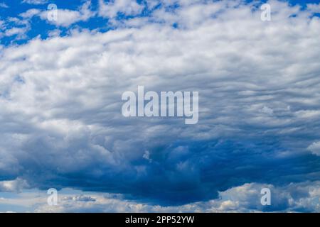 Dramatic cloud formations on sky before spring storm. Stock Photo