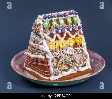 Traditional ginger bread house on a plate Stock Photo