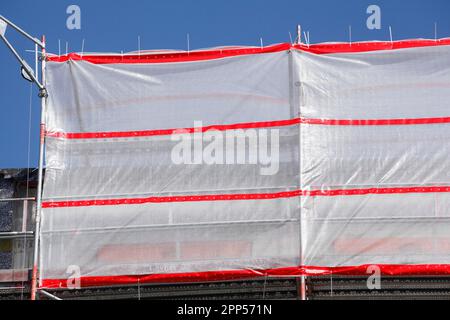 Tarpaulin, construction site, scaffolding, house facade, new construction, shell construction, Bremen, Germany Stock Photo